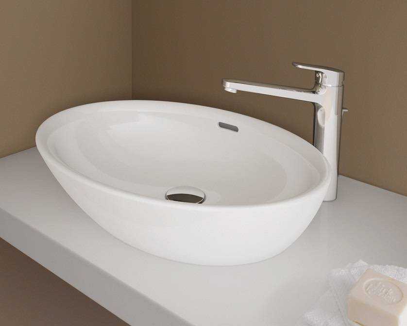 Накладные раковины в ванной комнате — размещение на столешнице и тумбе